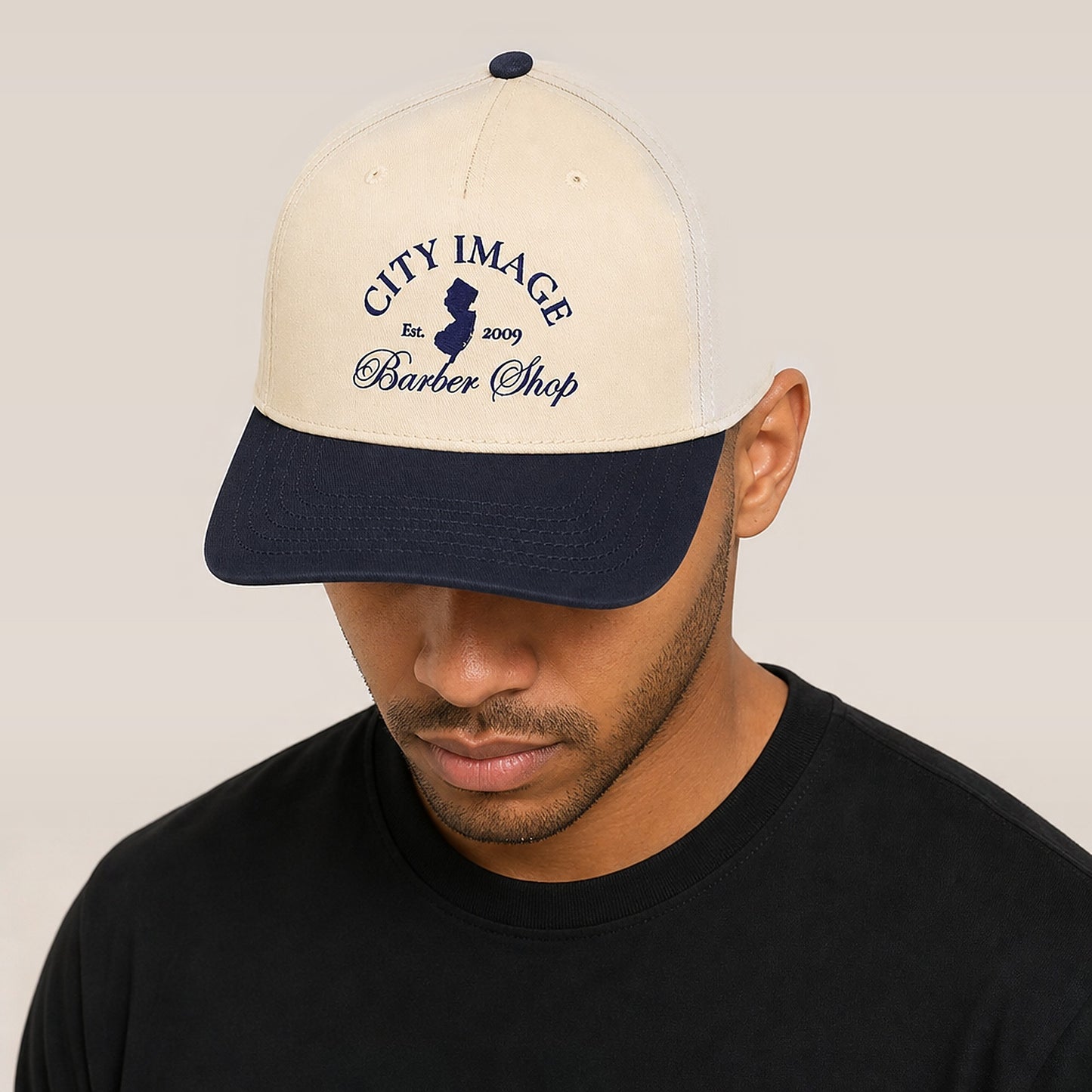 City Image 5 Panel Cap (Navy/Natural) — on model
